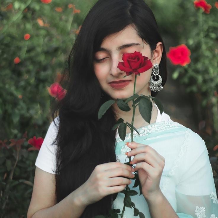 Alex Rivera, Lead Design Curator at StableMindFramework, reviewing corporate floral arrangements